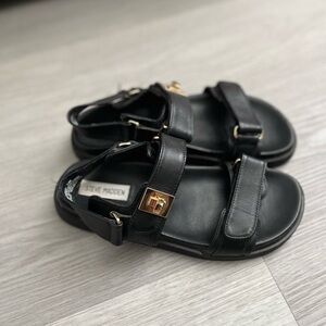Steve Madden Black Sandals with Gold Accents